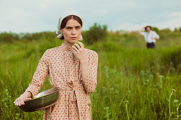 Image showing The healthy rural life. The woman in the green field