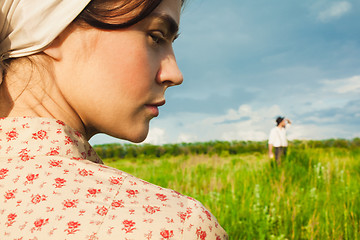 Image showing The healthy rural life. The woman and man in the green field