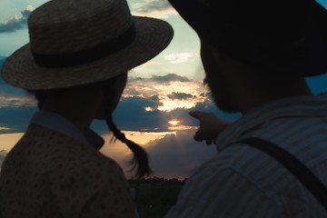 Image showing Young couple in love in the meadow