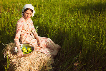 Image showing The healthy rural life. The woman in the green field