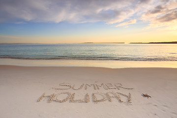 Image showing Summer Holiday etched into the sand of beach