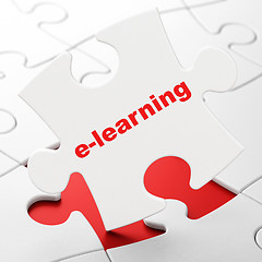 Image showing Studying concept: E-learning on puzzle background