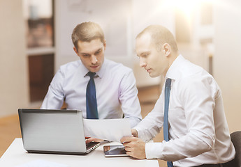 Image showing two businessmen having discussion in office