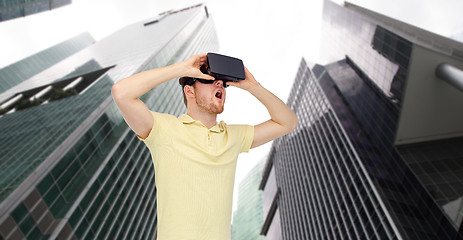 Image showing happy man in virtual reality headset or 3d glasses