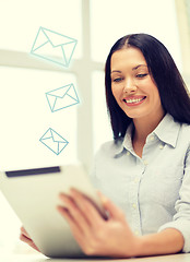 Image showing smiling businesswoman or student with tablet pc