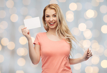 Image showing happy woman or teen girl with blank white paper