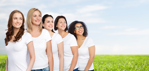 Image showing group of happy different women in white t-shirts