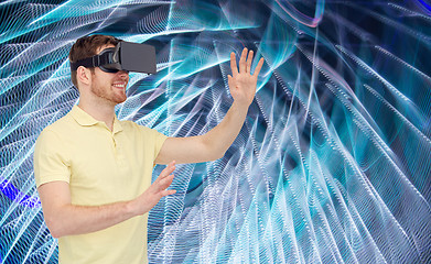 Image showing happy man in virtual reality headset or 3d glasses