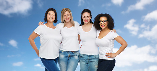 Image showing group of happy different women in white t-shirts