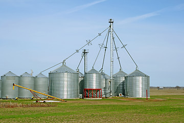 Image showing Grain silos on a farm in spring