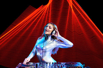 Image showing DJ girl on decks at the party