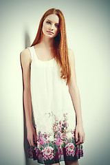 Image showing Beautiful female in sleeveless flower print summer dress