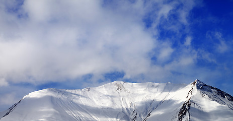 Image showing Panoramic view on off-piste snowy slope in wind day