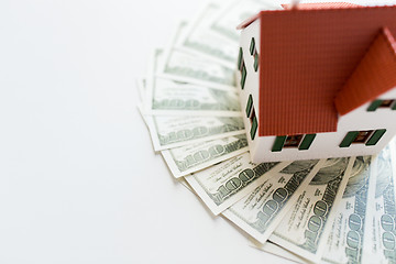 Image showing close up of home or house model and money