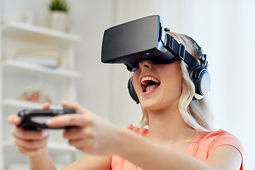 Image showing woman in virtual reality headset with controller