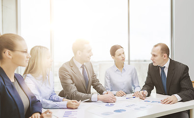 Image showing smiling business team at meeting