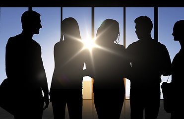 Image showing people silhouettes over office background