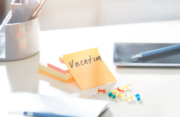 Image showing Vacation text on adhesive note
