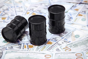 Image showing Oil drums on US dollars background