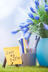 Image showing Adhesive note with Love my job text at green office