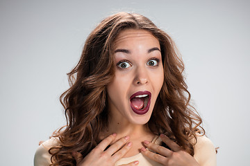 Image showing Portrait of young woman with shocked facial expression