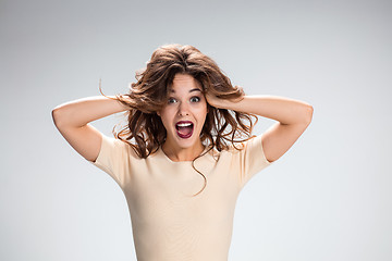 Image showing Portrait of young woman with shocked facial expression