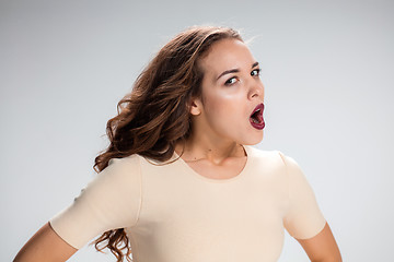 Image showing Portrait of young woman with shocked facial expression