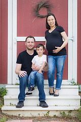 Image showing Portrait of Happy Mixed Race Pregnant Couple with Young Son