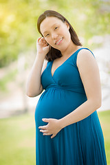 Image showing Young Pregnant Chinese Woman Portrait in Park