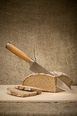 Image showing A slice of bread with butter 