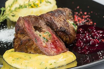 Image showing plate of grilled meat with fries