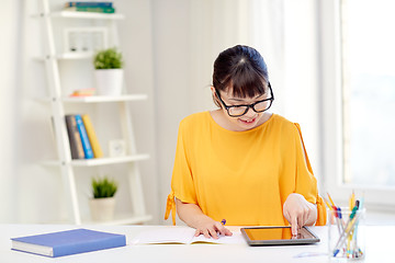 Image showing asian woman student with tablet pc at home