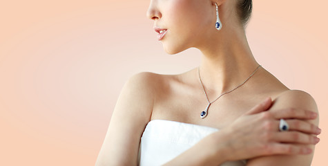 Image showing beautiful woman with earring, ring and pendant