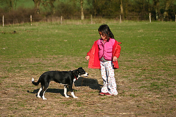 Image showing Child and dog