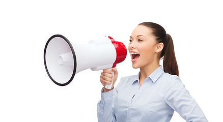 Image showing screaming businesswoman with megaphone