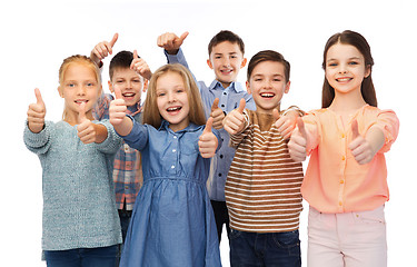 Image showing happy children showing thumbs up