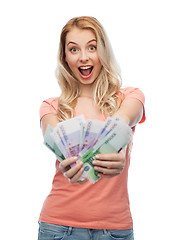 Image showing happy young woman with euro cash money