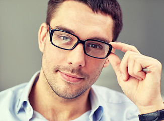 Image showing portrait of businessman in eyeglasses at office