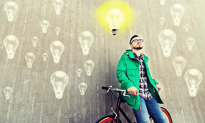 Image showing happy young hipster man with fixed gear bike