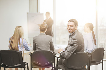 Image showing businessman with team in office