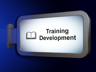 Image showing Education concept: Training Development and Book on billboard background