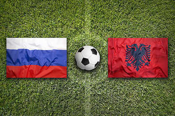 Image showing Russia vs. Albania flags on soccer field