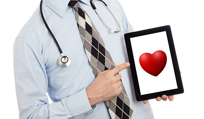 Image showing Doctor holding tablet - Red heart