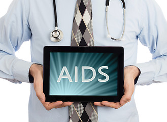 Image showing Doctor holding tablet - Aids