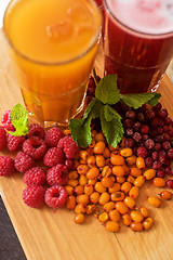 Image showing fruit drink with cranberries raspberries and sea buckthorn