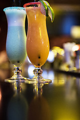 Image showing cocktails on bar background