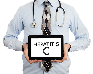 Image showing Doctor holding tablet - Hepatitis C