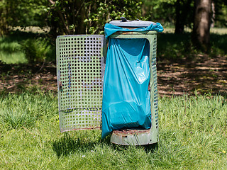 Image showing Broken litter bin in the park