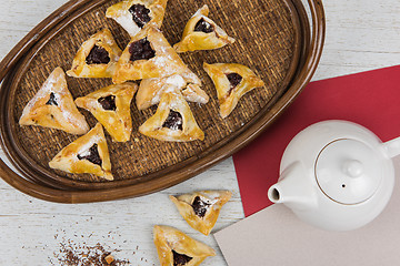 Image showing Tea, buns with jam