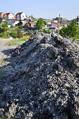 Image showing The soil is dumped in a pile during construction work